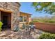 Outdoor patio area with brick flooring, perfect for relaxing and enjoying the Arizona weather at 28351 N 130Th Dr, Peoria, AZ 85383