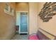 Comfortable entryway with decorative bench and tiled flooring, highlighting a welcoming ambiance at 28351 N 130Th Dr, Peoria, AZ 85383