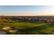 Expansive golf course view, surrounded by luxury desert homes with mountain views in the distance at 3529 N Boulder Canyon St, Mesa, AZ 85207