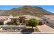 Charming home with manicured front yard, desert landscaping, and inviting entryway at 3529 N Boulder Canyon St, Mesa, AZ 85207