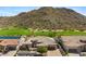 Single-story home featuring a well-manicured yard with mountain views at 3529 N Boulder Canyon St, Mesa, AZ 85207