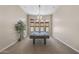 Bright game room with stylish chandelier lighting, pool table, and large window showcasing natural light at 3529 N Boulder Canyon St, Mesa, AZ 85207
