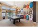 Entertainment room with pool table and sports memorabilia at 3529 N Boulder Canyon St, Mesa, AZ 85207