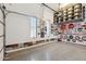 Spacious garage featuring epoxy floors, car memorabilia, windows, and high ceilings with ample storage at 3529 N Boulder Canyon St, Mesa, AZ 85207