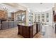 Open concept kitchen with large island, stainless appliances, and spacious living area at 3529 N Boulder Canyon St, Mesa, AZ 85207
