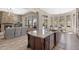Open-concept gourmet kitchen flowing into the living room and dining area at 3529 N Boulder Canyon St, Mesa, AZ 85207