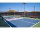 Well-maintained pickleball courts featuring new nets and benches, ready for play at 3529 N Boulder Canyon St, Mesa, AZ 85207