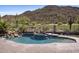 Resort-style backyard pool and spa with a waterfall feature at 3529 N Boulder Canyon St, Mesa, AZ 85207