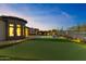 Luxurious backyard with putting green, pool and spa, and desert views at 3529 N Boulder Canyon St, Mesa, AZ 85207
