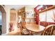Dining area featuring a round wooden table with matching wooden chairs at 359 Felspar Dr, Apache Junction, AZ 85119