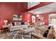 Bright living room featuring a modern color palette, stylish decor, and comfortable seating at 36469 W Alhambra St, Maricopa, AZ 85138