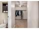 Large walk-in closet with well-organized hanging storage and lots of storage space at 38085 W San Capistrano Ave, Maricopa, AZ 85138