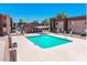 Community pool features a gazebo, shade, and fencing at 3810 N Maryvale Pkwy # 2029, Phoenix, AZ 85031