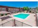 Community pool features a gazebo, shade, and fencing at 3810 N Maryvale Pkwy # 2029, Phoenix, AZ 85031