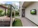 Outdoor space featuring patio, lounge seating, manicured lawn, and an outdoor mounted television for entertainment at 4216 N 27Th St # 108, Phoenix, AZ 85016