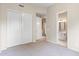 Bedroom view showing closet and open bathroom entrance at 4216 N 27Th St # 108, Phoenix, AZ 85016