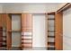 Walk-in closet with custom shelving and drawers to keep clothing and accessories organized at 4216 N 27Th St # 108, Phoenix, AZ 85016