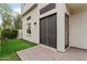Stylish modern home featuring a double-door front entrance and landscaped yard at 4216 N 27Th St # 108, Phoenix, AZ 85016