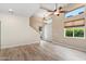 Living area featuring hardwood floors, recessed lighting, and double doors leading to the outdoor space at 4216 N 27Th St # 108, Phoenix, AZ 85016