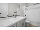 Clean bathroom with white countertops, modern fixtures, and a combined tub and shower at 4265 E John St, Gilbert, AZ 85295
