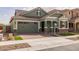 Lovely single-Gathering home with a two-car garage, nicely designed brick accents, and well-maintained landscaping at 4265 E John St, Gilbert, AZ 85295