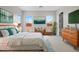 Inviting main bedroom featuring bright windows and stylish furniture at 4265 E John St, Gilbert, AZ 85295