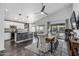 Bright dining room and island kitchen with bar stool seating perfect for entertaining at 4665 E Goldfinch Gate Ln, Phoenix, AZ 85044