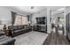 Comfortable living room featuring an open floor plan with dark wood floors and bright walls at 4665 E Goldfinch Gate Ln, Phoenix, AZ 85044