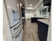 Modern kitchen featuring stainless steel appliances, modern floor, and beautiful countertops at 5431 W Cholla St, Glendale, AZ 85304