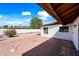 Home's backyard brick patio featuring a decorative firepit at 5434 E Acoma Dr, Scottsdale, AZ 85254