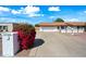 This home boasts a long driveway leading to a two car garage and beautiful desert landscaping at 5434 E Acoma Dr, Scottsdale, AZ 85254