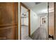 Hallway view into a room with a ceiling fan at 5434 E Acoma Dr, Scottsdale, AZ 85254
