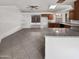 Bright kitchen area with granite counters, plenty of cabinet space and tiled floors at 5654 W Villa Theresa Dr, Glendale, AZ 85308