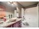 Bathroom featuring a stone vessel sink, granite counters and tile flooring at 6925 W Tonto Dr, Glendale, AZ 85308