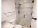 Modern bathroom with a glass-enclosed shower featuring white and gray tile at 6961 E Osborn Rd # B, Scottsdale, AZ 85251