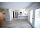 Inviting kitchen with white cabinets, stainless steel appliances, and a breakfast bar at 6961 E Osborn Rd # B, Scottsdale, AZ 85251