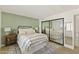 Relaxing bedroom features a large mirror, stylish decor, and a calming color scheme at 7930 E Camelback Rd # 409, Scottsdale, AZ 85251