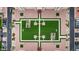 Overhead shot of a building courtyard with grass areas, walkways, and parking spots around the perimeter at 7930 E Camelback Rd # 409, Scottsdale, AZ 85251