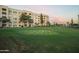 The property features a large putting green for resident enjoyment with beautiful sunset views at 7930 E Camelback Rd # 409, Scottsdale, AZ 85251