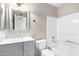 Bathroom with tub/shower, white vanity, and updated lighting and fixtures at 8014 W Mescal St, Peoria, AZ 85345