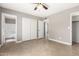 Neutral bedroom with tiled floors, closet and ensuite bathroom at 8014 W Mescal St, Peoria, AZ 85345