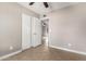 Bedroom showing tiled flooring, closet and doorway to another room at 8014 W Mescal St, Peoria, AZ 85345