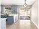 Modern kitchen area featuring a view to the backyard pool area at 8014 W Mescal St, Peoria, AZ 85345