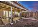 Outdoor patio featuring brick pavers, ceiling fan, and access to a small grassy area at 8226 N 32Nd Dr, Phoenix, AZ 85051