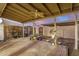 Covered patio area with pavers and fan provides ample space for outdoor relaxation and entertainment at 8226 N 32Nd Dr, Phoenix, AZ 85051