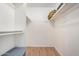 Walk-in closet offers ample storage with shelves and racks at 8226 N 32Nd Dr, Phoenix, AZ 85051