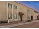 Townhome exterior with dual-pane windows and a tile roof entry at 8226 N 32Nd Dr, Phoenix, AZ 85051