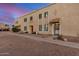 Exterior shot of a townhome with a tile roof entry at 8226 N 32Nd Dr, Phoenix, AZ 85051
