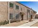 Exterior of a townhome featuring windows and a covered entry at 8226 N 32Nd Dr, Phoenix, AZ 85051