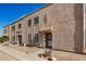 Exterior townhome featuring a textured facade and covered entrance at 8226 N 32Nd Dr, Phoenix, AZ 85051